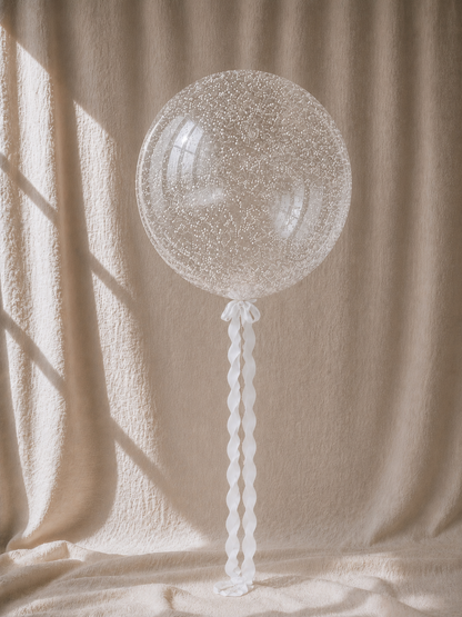Pearl Bobo — clear balloon with white pearls, no bows