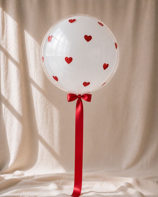 Sweetheart bobo — clear balloon with red hearts, POP Studio Auckland